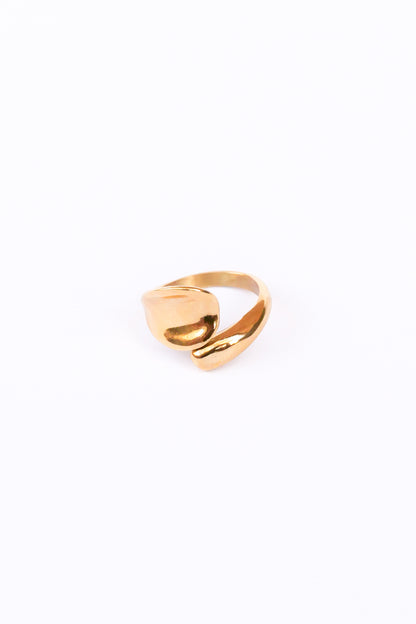 Front view of gold love open ring on white backdrop 